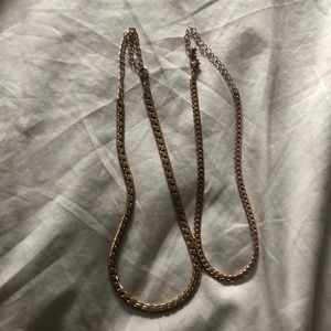 Two necklaces gold and pinkish gold